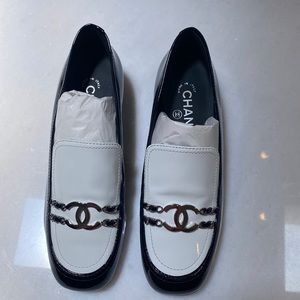 Black and white chanel loafer